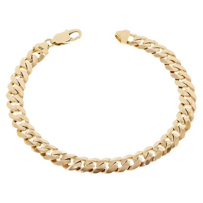 A polished yellow gold Cuban link chain bracelet with a lobster clasp, displayed in a curved shape on a solid white background.